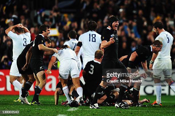Ali Williams of the All Blacks jumps in the air as All Black payers celebrate after an 8-7 victory in the 2011 IRB Rugby World Cup Final match...