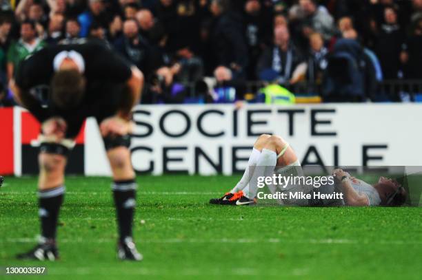 Imanol Harinordoquy of France lies on the ground dejected after losing 7-8 in the 2011 IRB Rugby World Cup Final match between France and New Zealand...