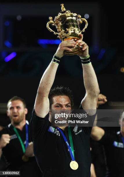 Captain Richie McCaw of the All Blacks lifts the Webb Ellis Cup after the 2011 IRB Rugby World Cup Final match between France and New Zealand at Eden...