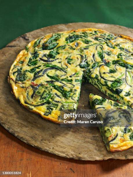 spinach cheese & caramelized red onion frittata - frittata stock pictures, royalty-free photos & images