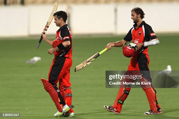 Callum Ferguson and Nathan Lyon of the Redbacks leaves the field after the Ryobi One Day Cup match between the South Australia Redbacks and the...