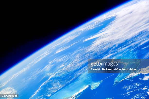 detail of planet earth seen from the iss, digital enhancement - landelement stockfoto's en -beelden