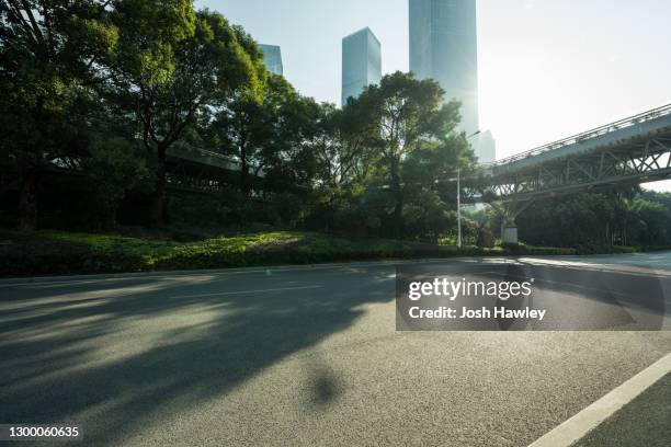 city road - urban road stock pictures, royalty-free photos & images