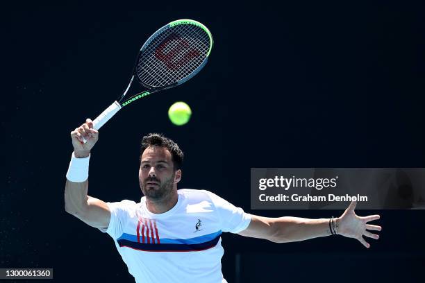 Salvatore Caruso of Italy plays a forehand in his match against Tennys Sandgren of the United States during day three of the ATP 250 Great Ocean Road...