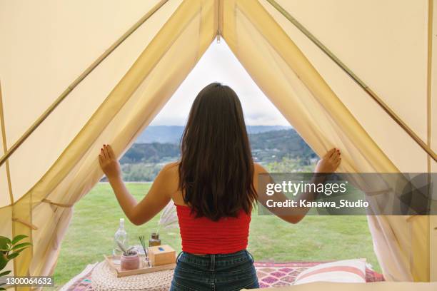 waking up to a beautiful scenic view - luxury tent stock pictures, royalty-free photos & images