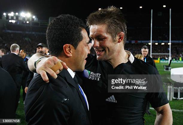 Mils Muliaina of the All Blacks celebrates with Richie McCaw of the All Blacks after the 2011 IRB Rugby World Cup Final match between France and New...
