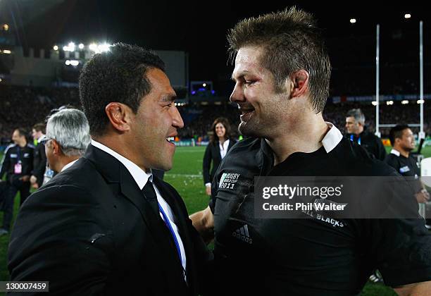 Mils Muliaina of the All Blacks celebrates with Richie McCaw of the All Blacks after the 2011 IRB Rugby World Cup Final match between France and New...