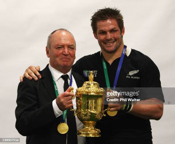 Graham Henry, coach of the All Blacks and Richie McCaw of the All Blacks pose with the Webb Ellis Cup after the 2011 IRB Rugby World Cup Final match...