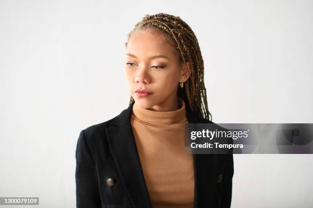 young businesswoman headshot portrait looking down. - portrait looking down stock pictures, royalty-free photos & images