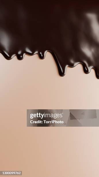 glossy brown drips flow down over beige background - 溶ける ストックフォトと画像