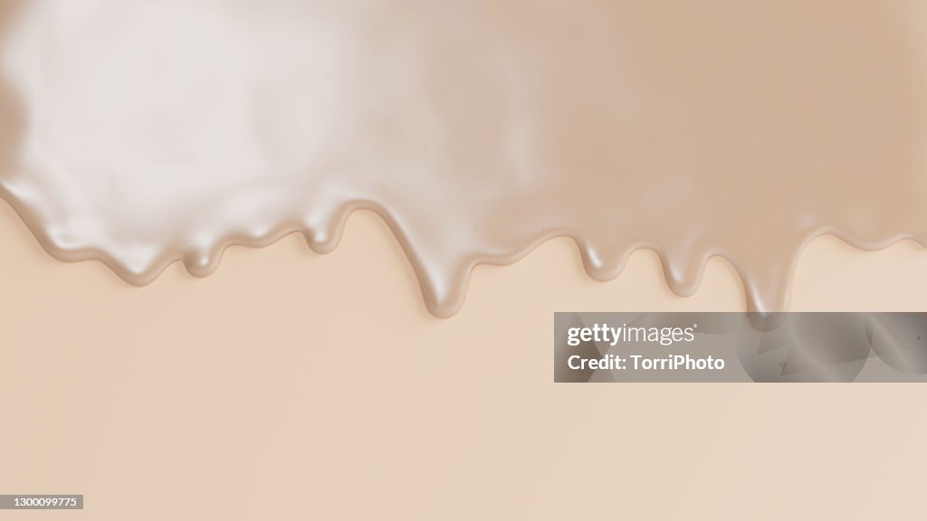 Glossy beige drips flows over beige background