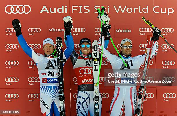 Ted Ligety of the USA takes 1st place, Alexis Pinturault of France takes 2nd place, Philipp Schoerghofer of Austria takes 3rd place during the Audi...