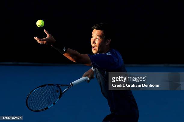 Yuichi Sugita of Japan serves in his match against Felix Auger-Aliassime of Canada during day three of the ATP 250 Murray River Open at Melbourne...
