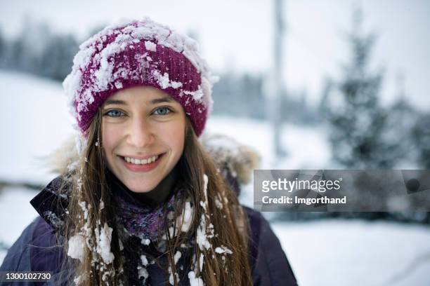portrait of a teenage girl playing on winter day - cute 15 year old girls stock pictures, royalty-free photos & images