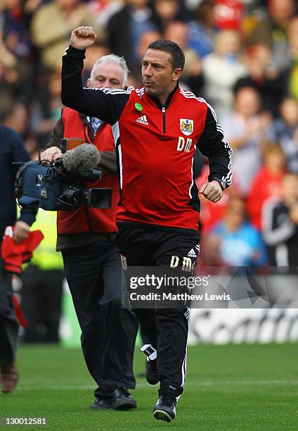 Derek McInnes, Bristol City's new manager waves to the Bristol City supporters during the npower Championship match between Bristol City and...