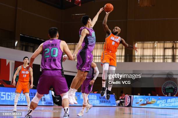 Robert Wilson 'Trae' Golden of Fujian Sturgeons shoots the ball during 2020/2021 Chinese Basketball Association League match between Shandong Heroes...