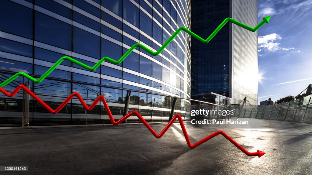 DGI K Curve and arrow green and red with business buildings in background