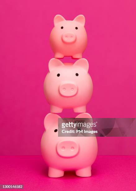 stacked piggy banks - happiness scale stock pictures, royalty-free photos & images