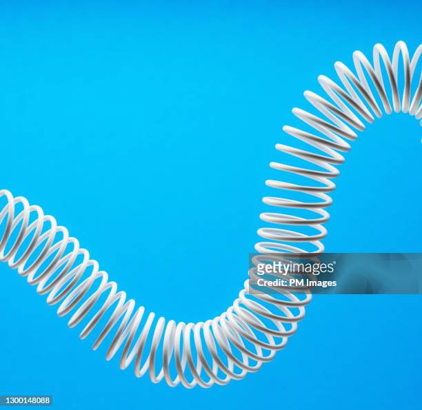 abstract white coil - metal coil toy stockfoto's en -beelden
