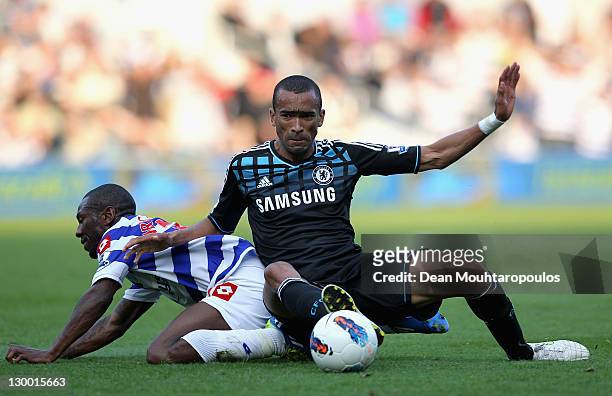 Jose Bosingwa of Chelsea fouls Shaun Wright-Phillips of Queens Park Rangers and is sent off by referee Chris Foy during the Barclays Premier League...