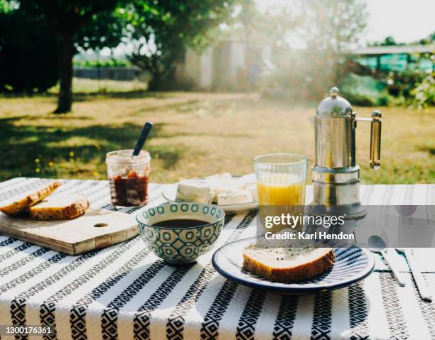 a sunrise view of breakfast in the french countryside - stock photo - breakfast photos et images de collection