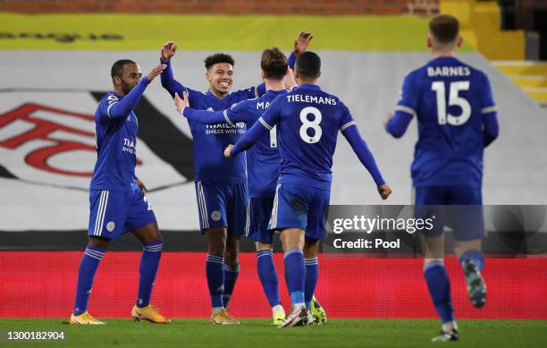 James Justin of Leicester City celebrates with Ricardo Pereira, James Maddison and Youri Tielemans after scoring his team's second goal during the...