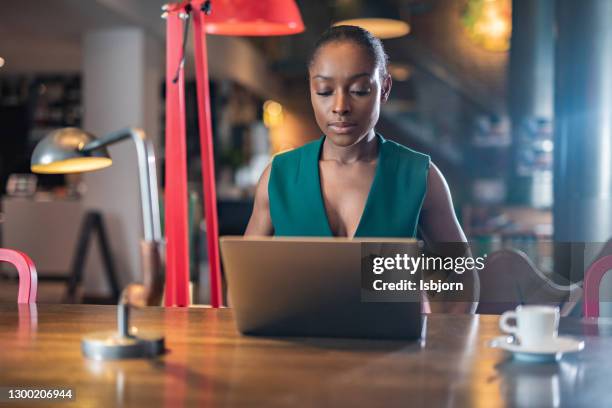 Readying Serious Woman Readying En Email In Office High-Res Stock Photo - Getty ...
