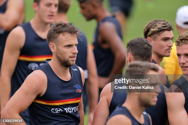 Brodie Smith of the Crows looks on during an Adelaide Crows AFL training session at West Lakes on February 04, 2021 in Adelaide, Australia.