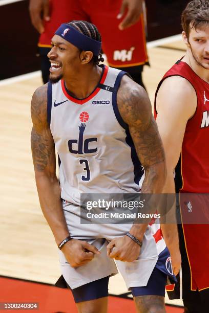 Bradley Beal of the Washington Wizards reacts after a basket against the Miami Heat during the fourth quarter at American Airlines Arena on February...