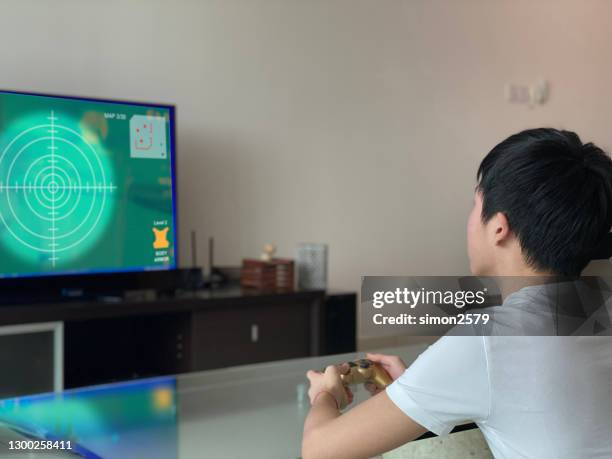 Watching Over Computer Kids Watching Tv On Computer Photos and Premium High Res Pictures ...