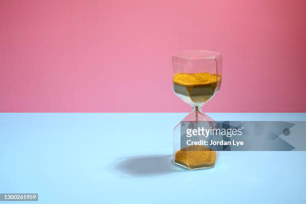 close-up of hourglass - time management stock pictures, royalty-free photos & images