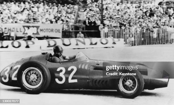 Argentinian racing driver Juan Manuel Fangio driving a Maserati 250F in the Monaco Grand Prix, Monte Carlo, 19th May 1957. He finished in first place.