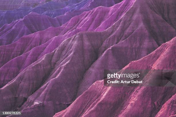 rugged sandstone eroded formations with beautiful chromatic scale. - hot pink stock-fotos und bilder