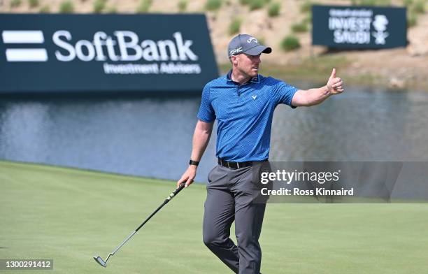 David Horsey of England reacts on the 18th green during Day One of the Saudi International powered by SoftBank Investment Advisers at Royal Greens...