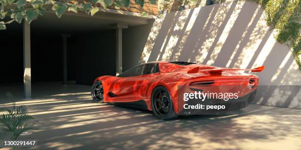 auto sportiva rossa generica parcheggiata sul vialetto dell'edificio moderno - car in driveway foto e immagini stock