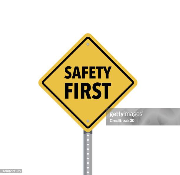 白い背景に隔離された安全第一のサイン - caution点のイラスト素材／クリップアート素材／マンガ素材／アイコン素材