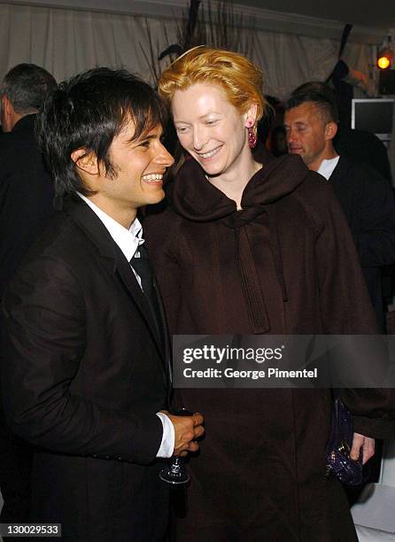 Gael Garcia Bernal and Tilda Swinton during 2004 Cannes Film Festival -"Motorcycle Diaries" - Party at La Plage Coste in Cannes, France.