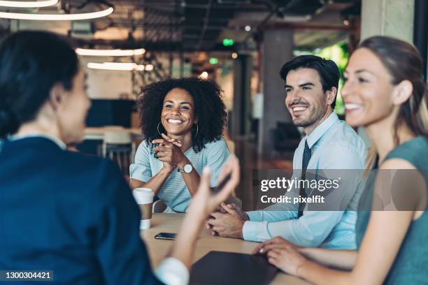 business persons on a meeting - business satisfaction stock pictures, royalty-free photos & images