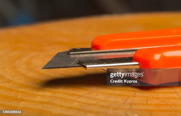 utility knife or box cutter - craft knife stock pictures, royalty-free photos & images