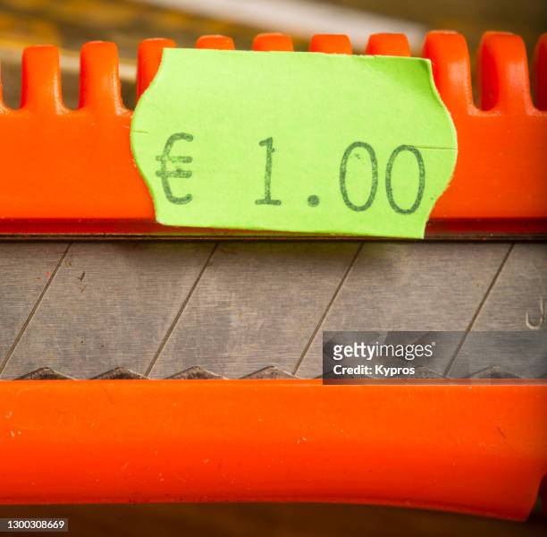1 euro price-tag in a european shop - money printer stock-fotos und bilder
