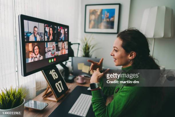 business meeting on video call during covid-19 lockdown - voice stock pictures, royalty-free photos & images
