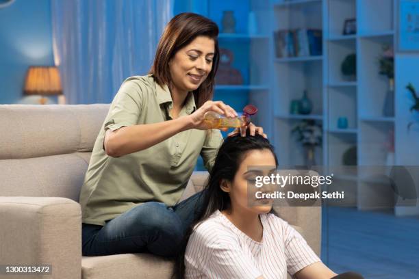 mother and daughter - stock photo - argan oil stock pictures, royalty-free photos & images