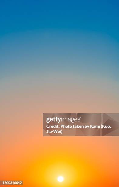 sunset and gradient sky - golden clouds stockfoto's en -beelden