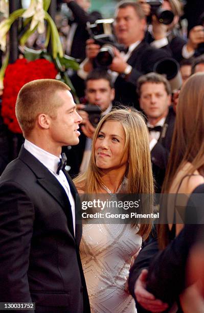 Brad Pitt and Jennifer Aniston during 2004 Cannes Film Festival - "Troy" Premiere at Palais Du Festival in Cannes, France.