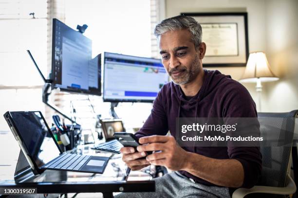 man working in home office - real businessman isolated no smile fotografías e imágenes de stock