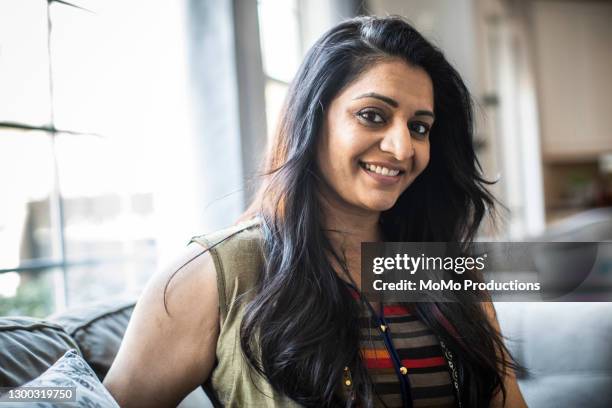 portrait of woman wearing traditional indian clothing - indian woman stock pictures, royalty-free photos & images