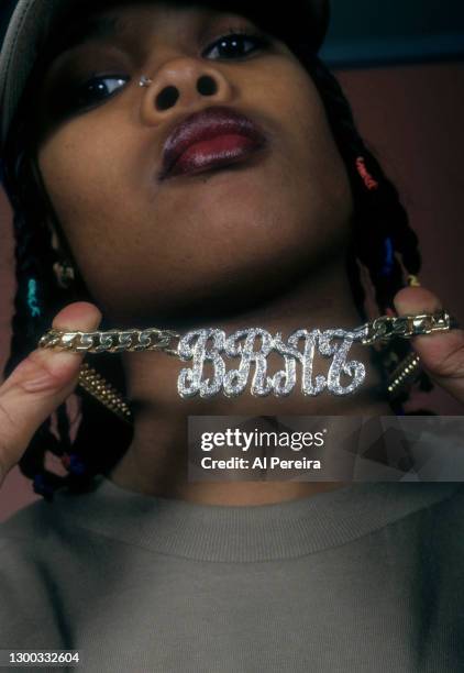 Rapper Da Brat appears in a portrait wearing a "Dickies" cap and a bling chain with her name on April 10, 1994 in New York City.