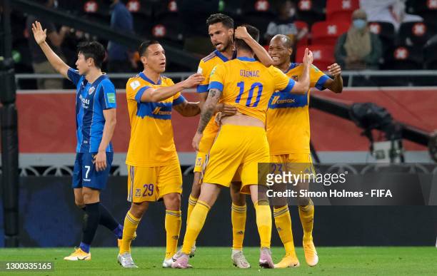 Andre-Pierre Gignac of Tigres UANL celebrates after scoring their sides second goal with team mates Jesus Duenas, Diego Reyes and Luis Quinones...