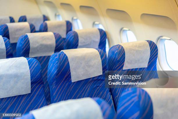seats in aircraft cabin - airplane seats stock pictures, royalty-free photos & images