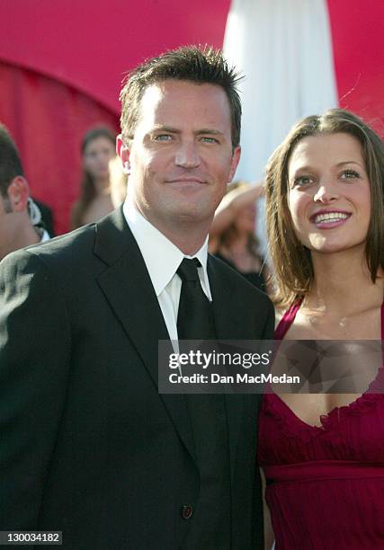 Matthew Perry and Rachel Dunn during 55th Annual Primetime Emmy Awards - Arrivals by MacMedan at The Shrine Theater in Los Angeles, California,...